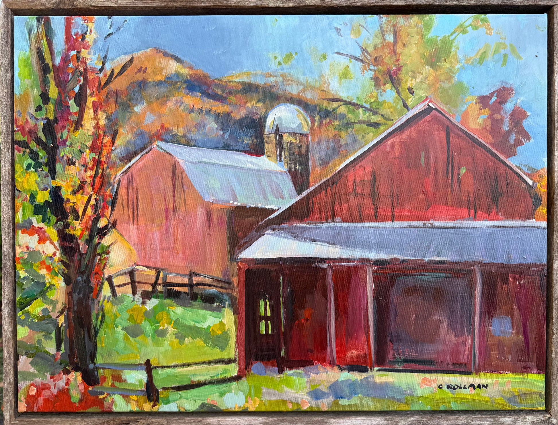 Painting of a red barn with a green landscape. Acrylic painting by Charlotte Rollman.